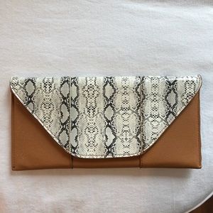 Snake skin clutch